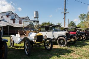 Model T's in front of Cotton Gin