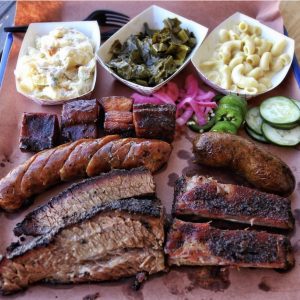 LJ's BBQ, plate of sausage, ribs, brisket, potato salad, collard green and mac and cheese. Photo by Natalie Lacy Lange