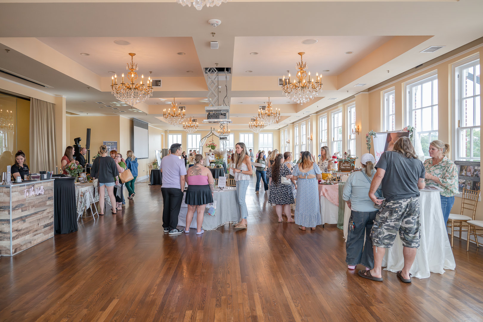 Future brides browse vendors' booths at the Fall Wedding Show at The Barnhill Center in Downtown Brenham.